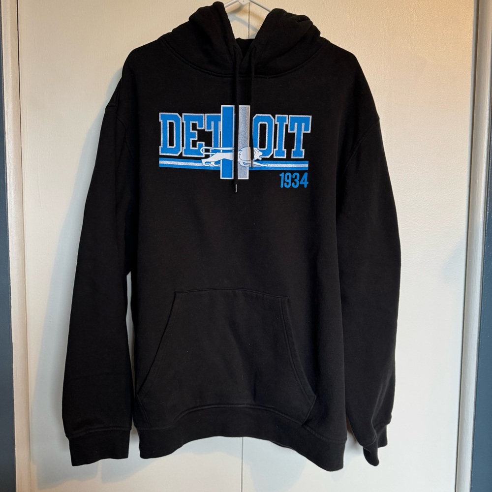 New Era Black Pullover Hoodie with Blue and White Detroit Graphic
